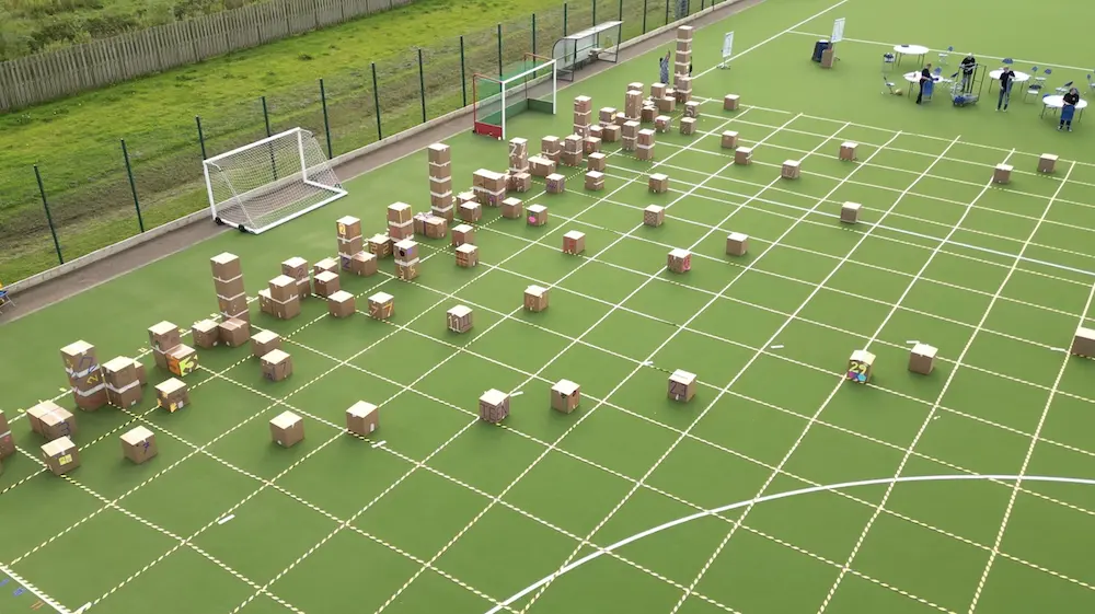 Photo of Number City, showing towers of different heights made from cardboard boxes